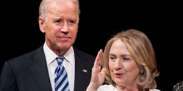 April 2, 2013: Vice President Joe Biden and former Secretary of State Hillary Rodham Clinton appear onstage at the Kennedy Center for the Performing Arts in Washington. (AP)