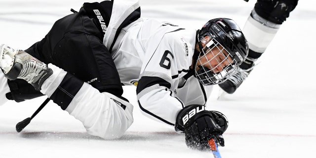 Singer Justin Bieber takes a fall during the first period of the NHL All-Star Celebrity Shootout on Saturday, Jan. 28, 2017, in Los Angeles. The NHL All-Star Game is scheduled to be played Sunday. (AP Photo/Mark J. Terrill)