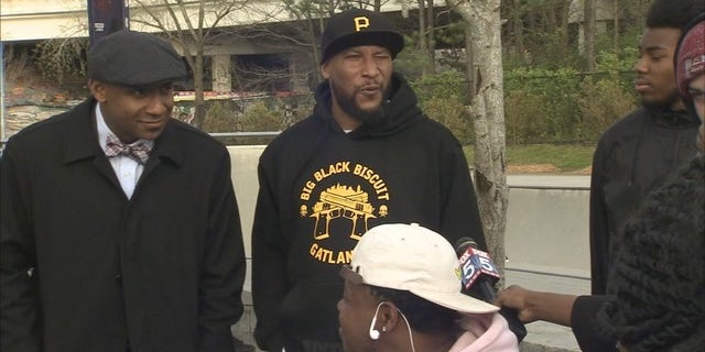 The man was claiming his shirt's gun logo got him kicked off a flight.