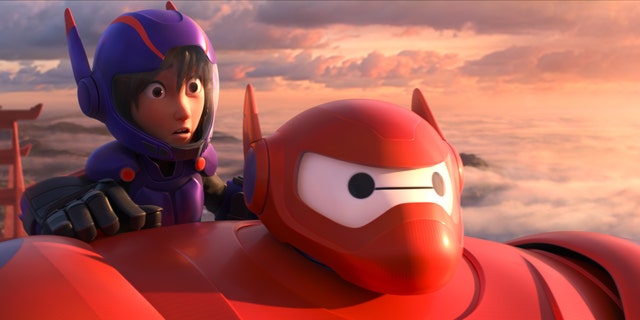 Animated characters Hiro Hamada, voiced by Ryan Potter, left, and Baymax, voiced by Scott Adsit, in a scene from "Big Hero 6."