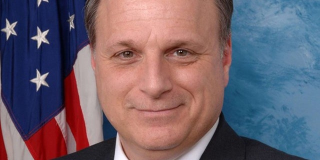 Former Rep. Eric Massa poses in his official 2009 House photo.