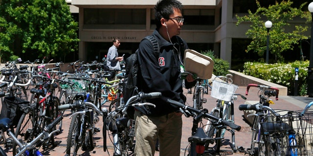 May 9, 2014: Students navigate a bicycle parking lot at Stanford University in Stanford, Calif.