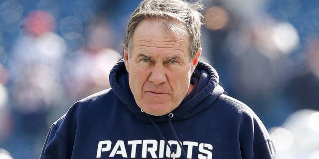 FOXBORO, MA - OCTOBER 27: Bill Belichick of the New England Patriots walks onto the field before a game with the Miami Dolphins at Gillette Stadium on October 27, 2013 in Foxboro, Massachusetts. (Photo by Jim Rogash/Getty Images)