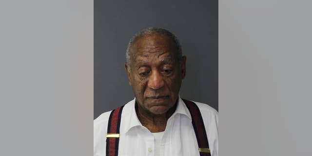 Bill Cosby takes booking photo after entering prison on Tuesday.