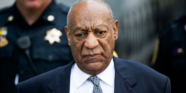 In this Aug. 22, 2017, file photo, Bill Cosby leaves Montgomery County Courthouse after a hearing in his sexual assault case in Norristown, Pa.