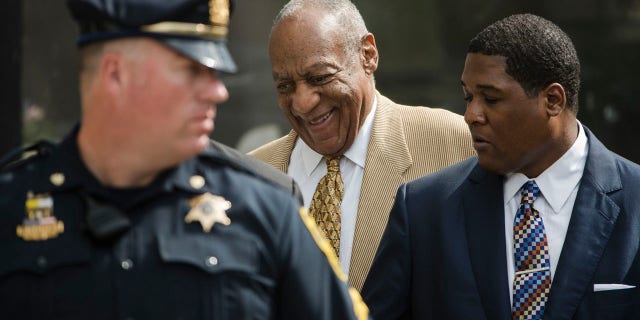 July 7, 2016: Bill Cosby, center, leaves a pretrial hearing in his criminal sex-assault case at Montgomery County Courthouse in Norristown, Pa