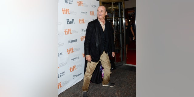 September 5, 2014. A drenched Bill Murray arrives at the "St. Vincent" premiere during the Toronto International Film Festival on Friday, Sept. 5, 2014, in Toronto.