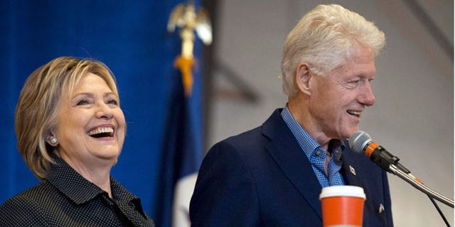 FILE: Nov. 15, 2015: Former U.S. President Clinton with wife Democratic presidential candidate Hillary Clinton at a barbecue in Ames, Iowa. (REUTERS)