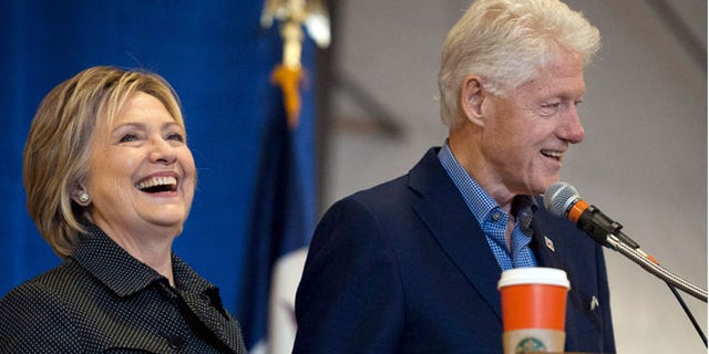 FILE: Nov. 15, 2015: Former U.S. President Clinton with wife Democratic presidential candidate Hillary Clinton at a barbecue in Ames, Iowa. (REUTERS)