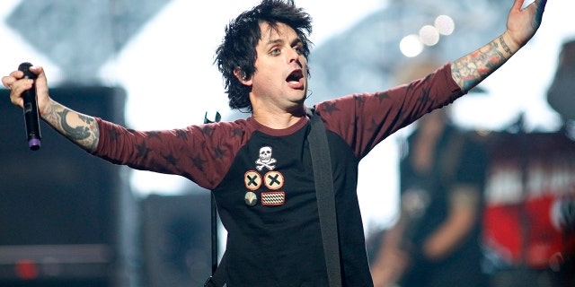 Green Day lead vocalist and guitarist Billie Joe Armstrong performs with the group during the 2012 iHeart Radio Music Festival in Las Vegas, Nevada September 21, 2012.