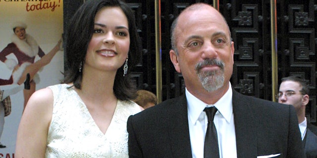 Billy Joel and his girlfriend Kate Lee arrive for the 57th Annual Tony Awards at Radio City Music Hall, Sunday, June 8, 2003, in New York. (AP Photo/Tina Fineberg)