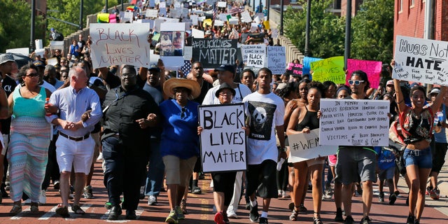 People march in a Black Lives Matter rally in Oklahoma City, Oklahoma.