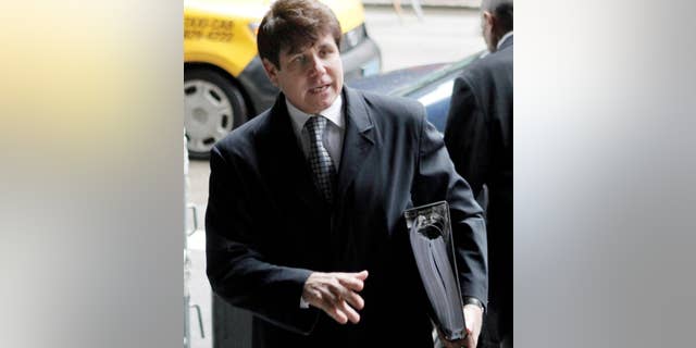 Former Illinois Gov. Rod Blagojevich, arrives at federal court before taking the stand in his second corruption trial, Thursday, May 26, 2011, in Chicago. (AP Photo/M. Spencer Green)