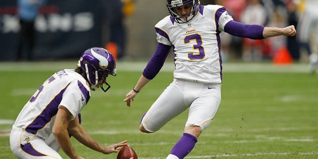 HOUSTON, TX - DECEMBER 23: Blair Walsh #3 of the Minnesota Vikings kicks a field goal during practice out of the hold of Chris Kluwe #5 of the Minnesota Vikings against the Minnesota Vikings at Reliant Stadium on December 23, 2012 in Houston, Texas. Minnesota Vikings defeat the Houston Texans 23-6. (Photo by Bob Levey/Getty Images)