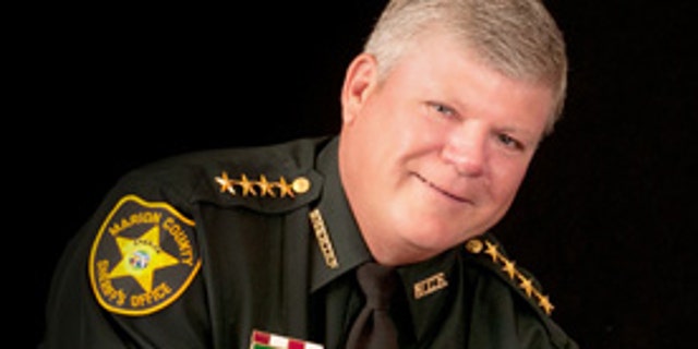 Marion County Sheriff Chris Blair, who has said, “If you are certified to carry a gun, I would like to encourage you to do so.”