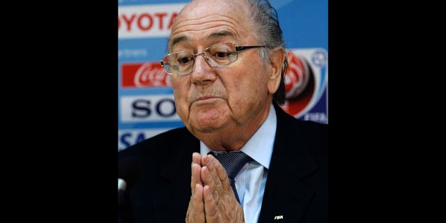 FIFA President Joseph S. Blatter, gestures during a press conference for the FIFA Club World Cup at Zayed sport city stadium, in Abu Dhabi, United Arab Emirates Friday, Dec. 17, 2010.(AP Photo/Hussein Malla)