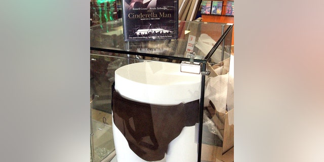 A display case featuring the DVD of the movie "Cinderella Man" and the jockstrap worn by actor Russell Crowe in the movie at a Blockbuster video store in Anchorage, Alaska.