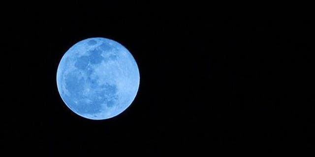This photo of a blue moon was taken from Boca Raton, Fla., on New Year's Eve 2009. Blue moons aren't actually blue-hued, though that's not to say humans haven't seen blue and even green moons.