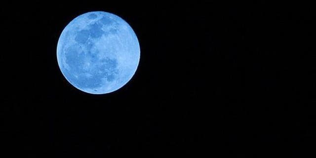 This photo of a blue moon was taken from Boca Raton, Fla., on New Year's Eve 2009. Blue moons aren't actually blue-hued, though that's not to say humans haven't seen blue and even green moons.