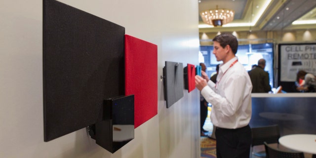 Bluetooth speakers using electrostatic loudspeaker (ESL) technology are displayed in the In2uit booth during the Consumer Electronics Show (CES) in Las Vegas January 9, 2013. (REUTERS/Steve Marcus)