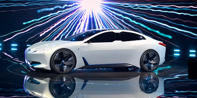 BMW i vision dynamics is presented at a BMW event during the first media day of the International Frankfurt Motor Show IAA in Frankfurt, Germany, Tuesday, Sept. 12, 2017, which runs through Sept. 24, 2017. (AP Photo/Martin Meissner)
