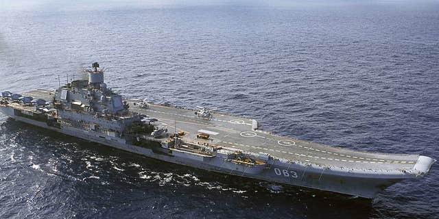 The Admiral Kuznetsov carrier sails in the Barents Sea, Russia.