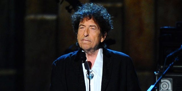 Bob Dylan is shown at an awards event in Los Angeles, Feb. 6, 2015. A door from a room in which he stayed at New York City's Chelsea Hotel recently sold for $125,000.