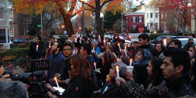 Immigrants hold a protest vigil for immigration reform outside the home of House Speaker John Boehner.