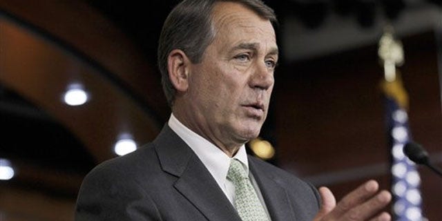 House Speaker John Boehner gestures during a news conference on Capitol Hill in Washington Jan. 26.