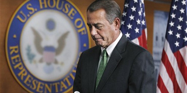House Speaker John Boehner leaves a news conference on Capitol Hill in Washington Feb. 10.