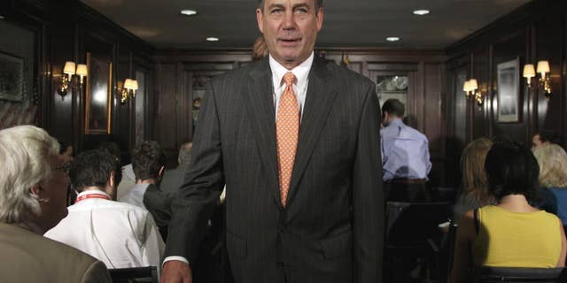 House Speaker John Boehner of Ohio leaves after making a statement at The Republican National Committee on Capitol Hill in Washington, Tuesday, July 26, 2011. (AP Photo/Carolyn Kaster)
