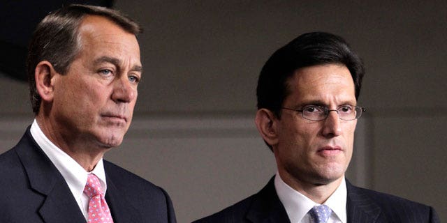 In this file photo of Thursday, June 16, 2011, House Majority Leader Eric Cantor of Virginia, right, stands with House Speaker John Boehner of Ohio on Capitol Hill in Washington. (AP)