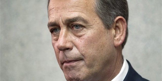 House Speaker John Boehner pauses during a news conference on Capitol Hill April 15.