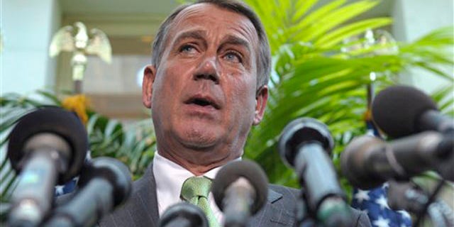 House Speaker John Boehner speaks at a news conference on Capitol Hill in Washington July 12.