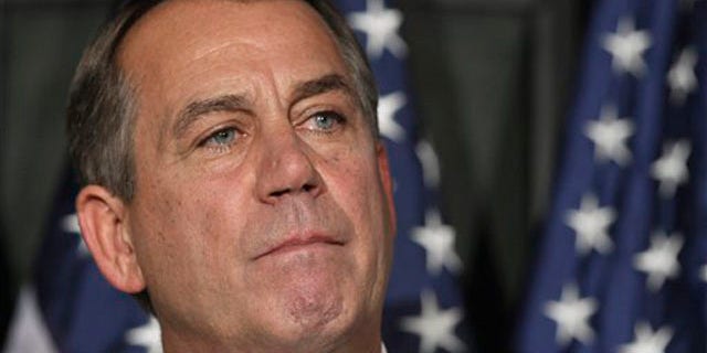 House Speaker John Boehner pauses during a news conference at The Republican National Committee on Capitol Hill in Washington July 26.