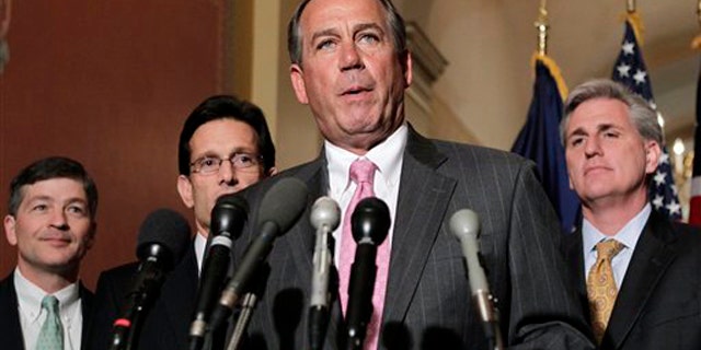 House Speaker John Boehner and other GOP leaders discuss budget negotiations on Capitol Hill in Washington March 29.