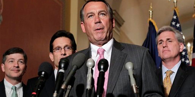 House Speaker John Boehner and other GOP leaders discuss budget negotiations on Capitol Hill in Washington March 29.