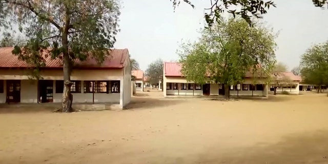 This image taken from video on Thursday Feb. 22, 2018 shows the exterior of Government Girls Science and Technical College in Dapchi, Nigeria.