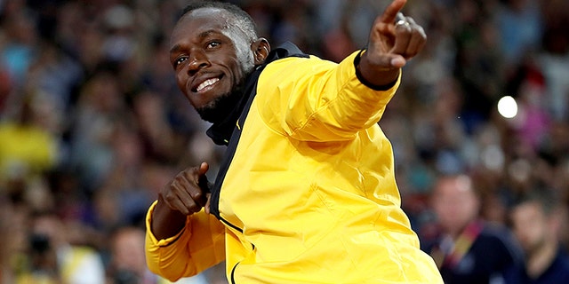 Usain Bolt of Jamaica after his final race at the World Athletics Championships in London, August 13, 2017.