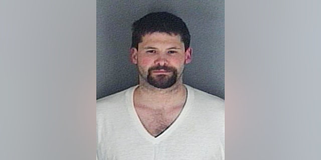 This undated file photo provided by the Shawnee County Jail in Topeka, Kan., shows Alexander Blair, of Topeka.