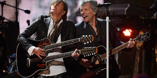 Richie Sambora, left, and Jon Bon Jovi perform during the Rock and Roll Hall of Fame induction ceremony, Saturday, April 14, 2018, in Cleveland.
