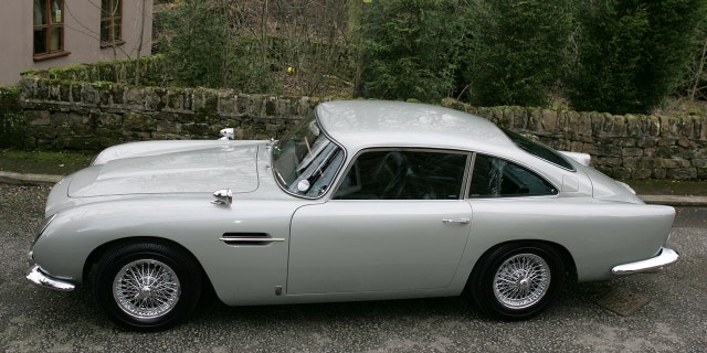 The Aston Martin DB5 driven by James Bond in GoldenEye is set to sell for £1.6 MILLION at auction.See story SWBOND.In the 1995 film, 007 - played by Pierce Brosnan - raced the classic British sports car around the Monaco hills in pursuit of Xenia Onatopp, the Ferrari-driving assassin played by Famke Janssen.It was Brosnanâs first appearance as the MI6 agent - and was the first time Bond drove an Aston Martin DB5 since the days of Sean Conneryâs playing the spy. After filming, the 1965 car was used by Eon Productions for promoting the Motion Picture GoldenEye and the retro styled DB7. The DB5 was bought by its current owner in 2001 - and they are now selling it at Bonhamsâ Festival of Speed sale in Goodwood on July 13. Bonhams has given it a guide price of £1.6 million.