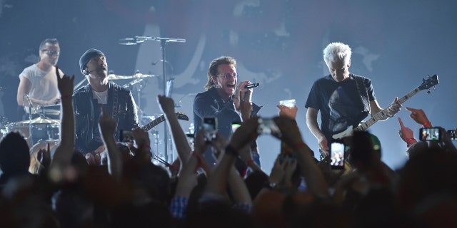 U2 performs during special Apollo Theater performance in New York City.
