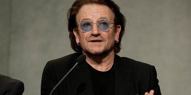 U2 rock band frontman Bono Vox talks to reporters during a press conference he held at the end of a meeting with Pope Francis, at the Vatican, Wednesday, Sept. 19, 2018. (AP Photo/Andrew Medichini)