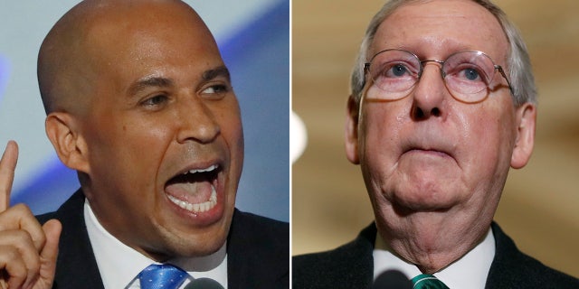 Sen. Cory Booker, D-N.J., left, remained hopeful Wednesday that Senate Majority Leader Mitch McConnell, R-Ky., would bring to the Senate floor legislation designed to protect Special Counsel Robert Mueller from being fired.