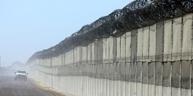 A U.S. border patrol agent fatally shot an illegal immigrant in Texas Wednesday, authorities said. File photo showing the fence along the U.S. southern border.