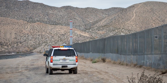 Jan. 4, 2016: , A U.S. Border Patrol agent drives near the U.S.-Mexico border fence in Sunland Park, N.M.