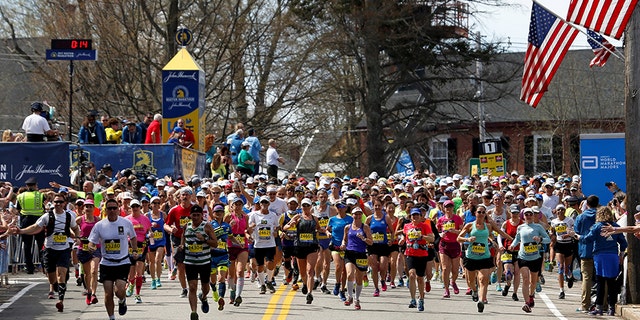 April 17, 2017: Runners cross the starting line at the 121st running of the Boston Marathon.