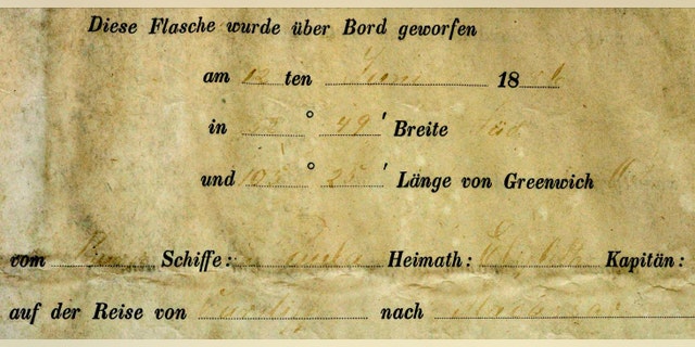 An enhanced image shows handwritten details of the date and coordinates when message when it was thrown into the sea. It also has details of the "Paula's" name, home port and voyage (Ross Anderson/WA Museum)