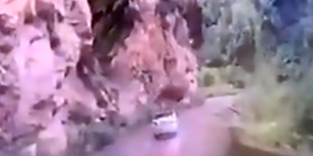 Rains loosened the boulder from the cliff.